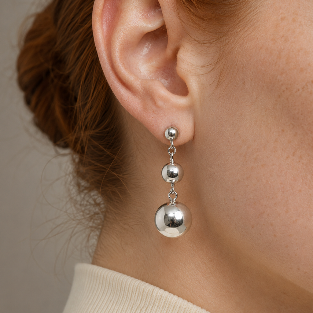Aretes Toj
